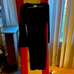 The tag reads Ruby it’s a Vintage Beautiful little black dress size s